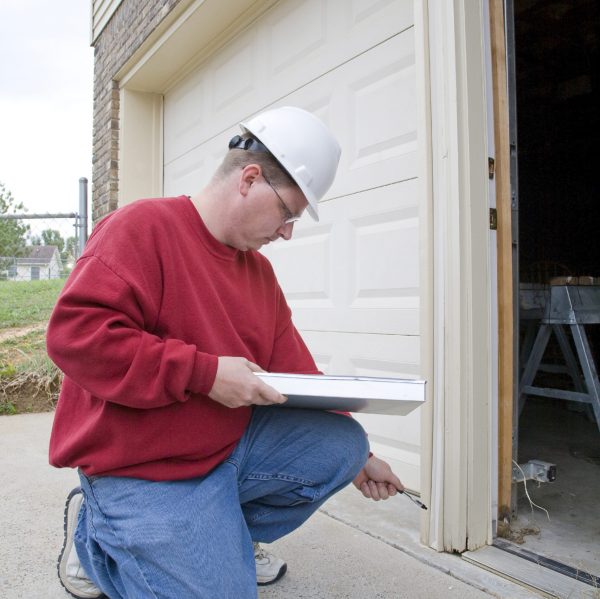 Home inspector looking for possible problems for a potential buyer, found rotted wood frame on exterior door frame